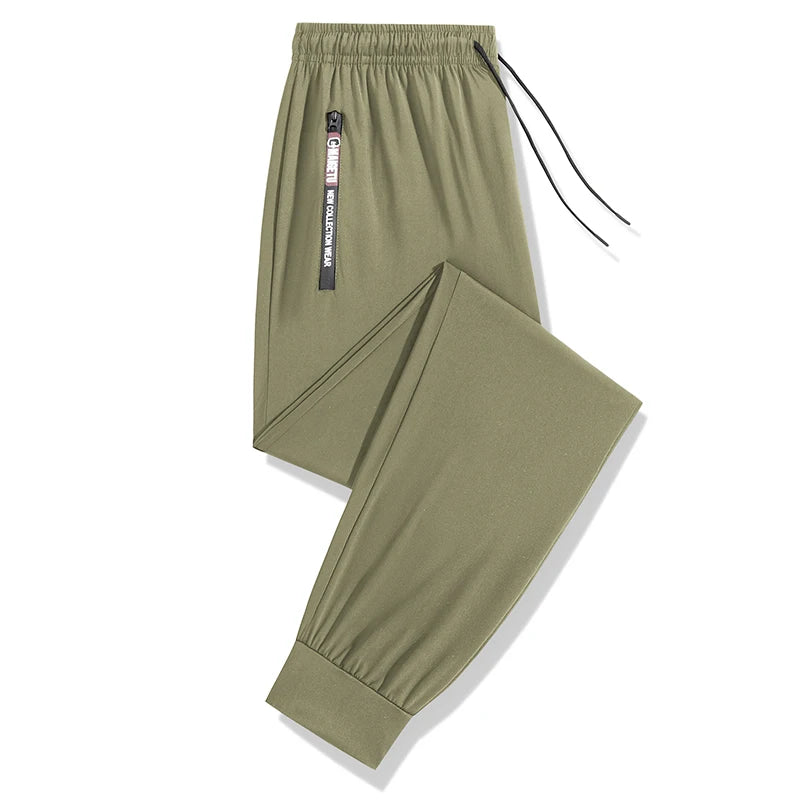 Men's lightweight, stretchy, quick-drying sports pants with zipper pockets