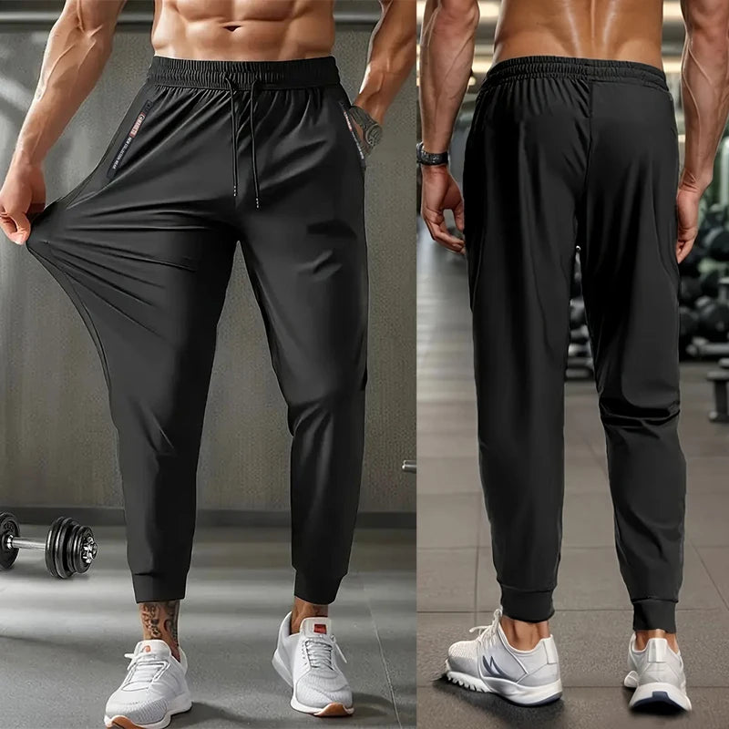 Men's lightweight, stretchy, quick-drying sports pants with zipper pockets